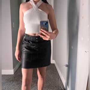 White Crop Top & Black Leather Mini Skirt